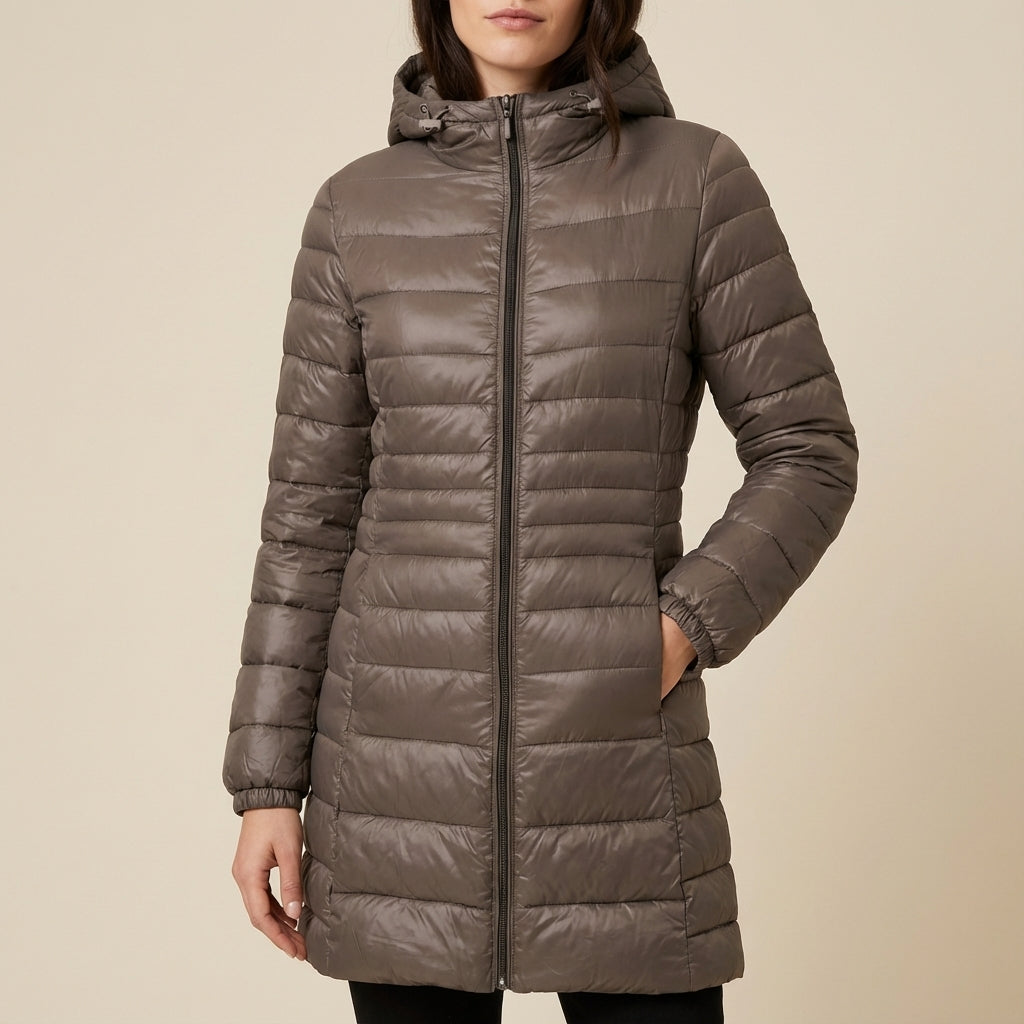 Kurtka zimowa damska pikowana długa z kapturem | Styl miejski